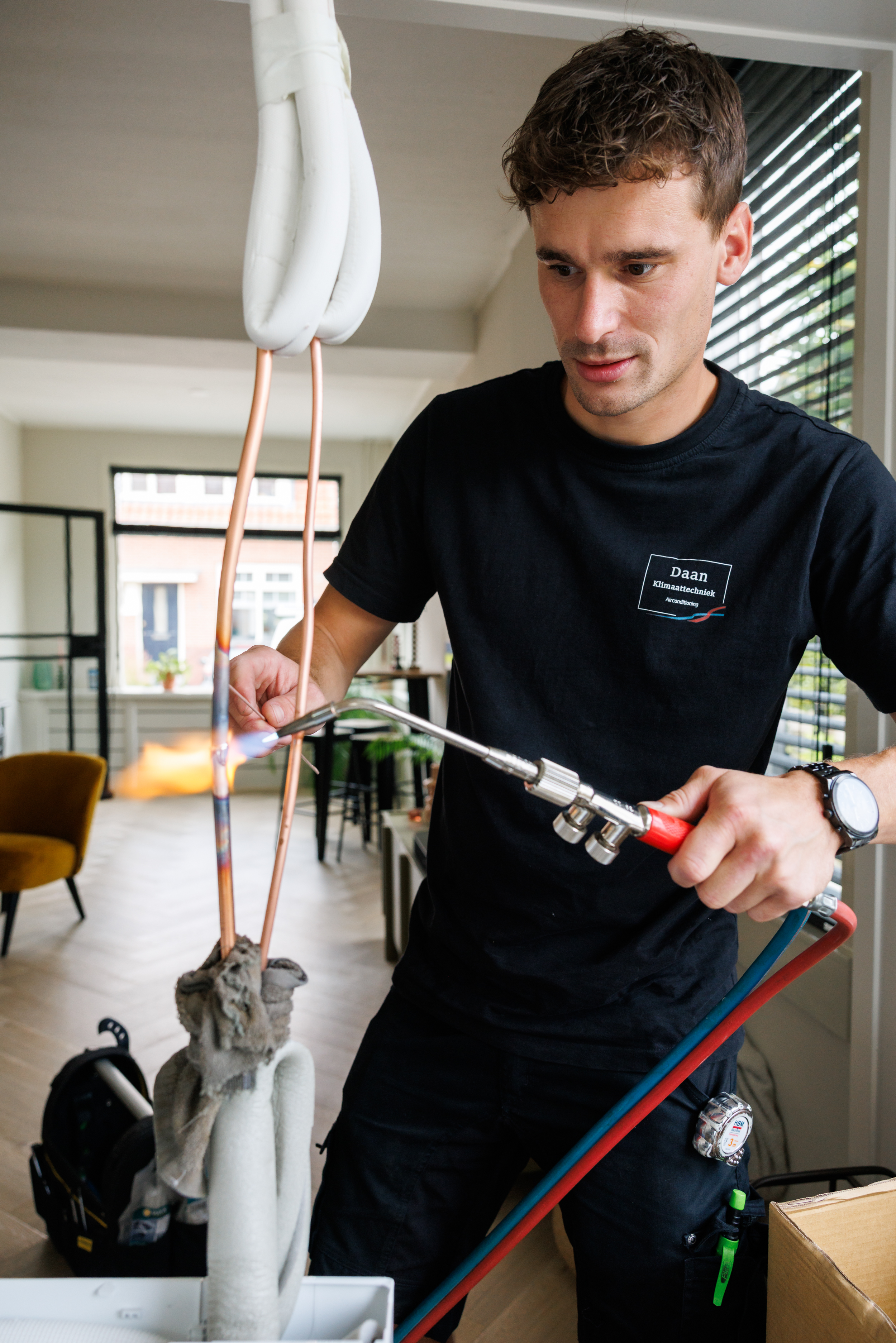 Daan Klimaattechniek monteur aan het werk